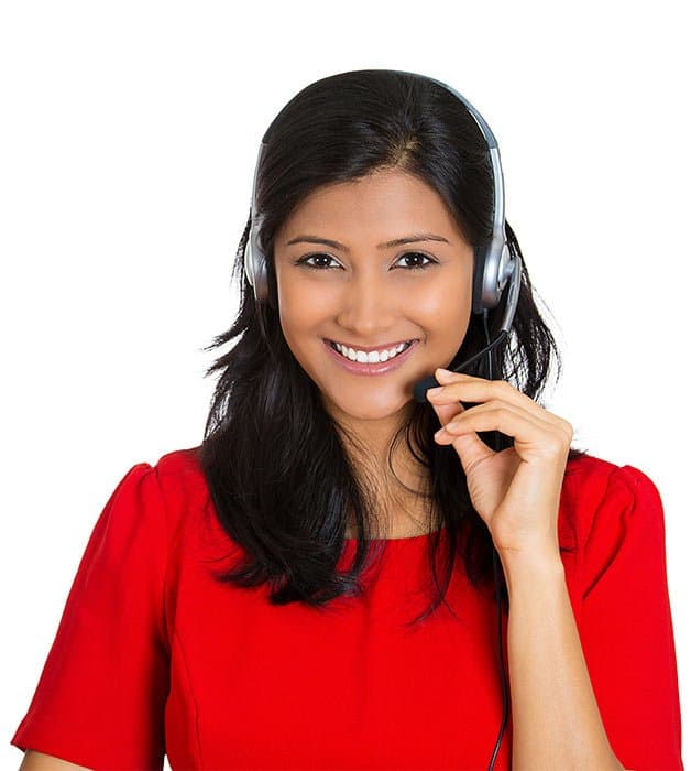 Women holding headset and smiling into camera