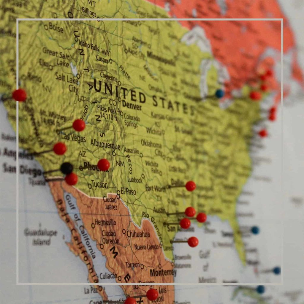 Map of the United States marked with push pins